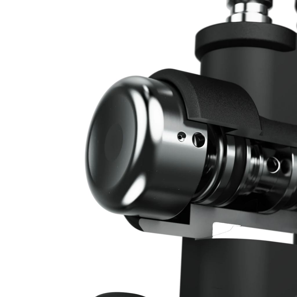 Close-up of the polished port cover, mounting screws and diaphragm cap