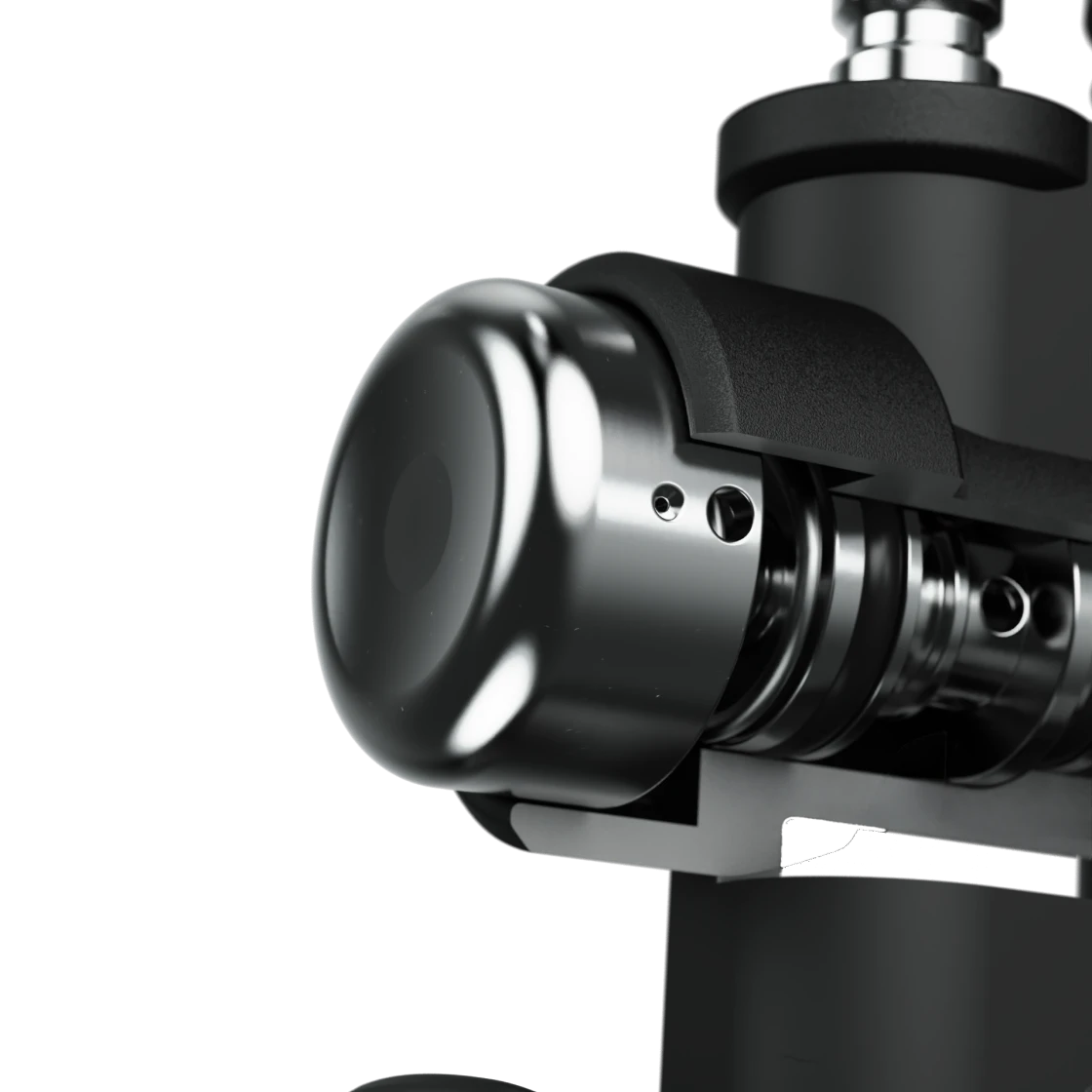 Close-up of the polished port cover, mounting screws and diaphragm cap