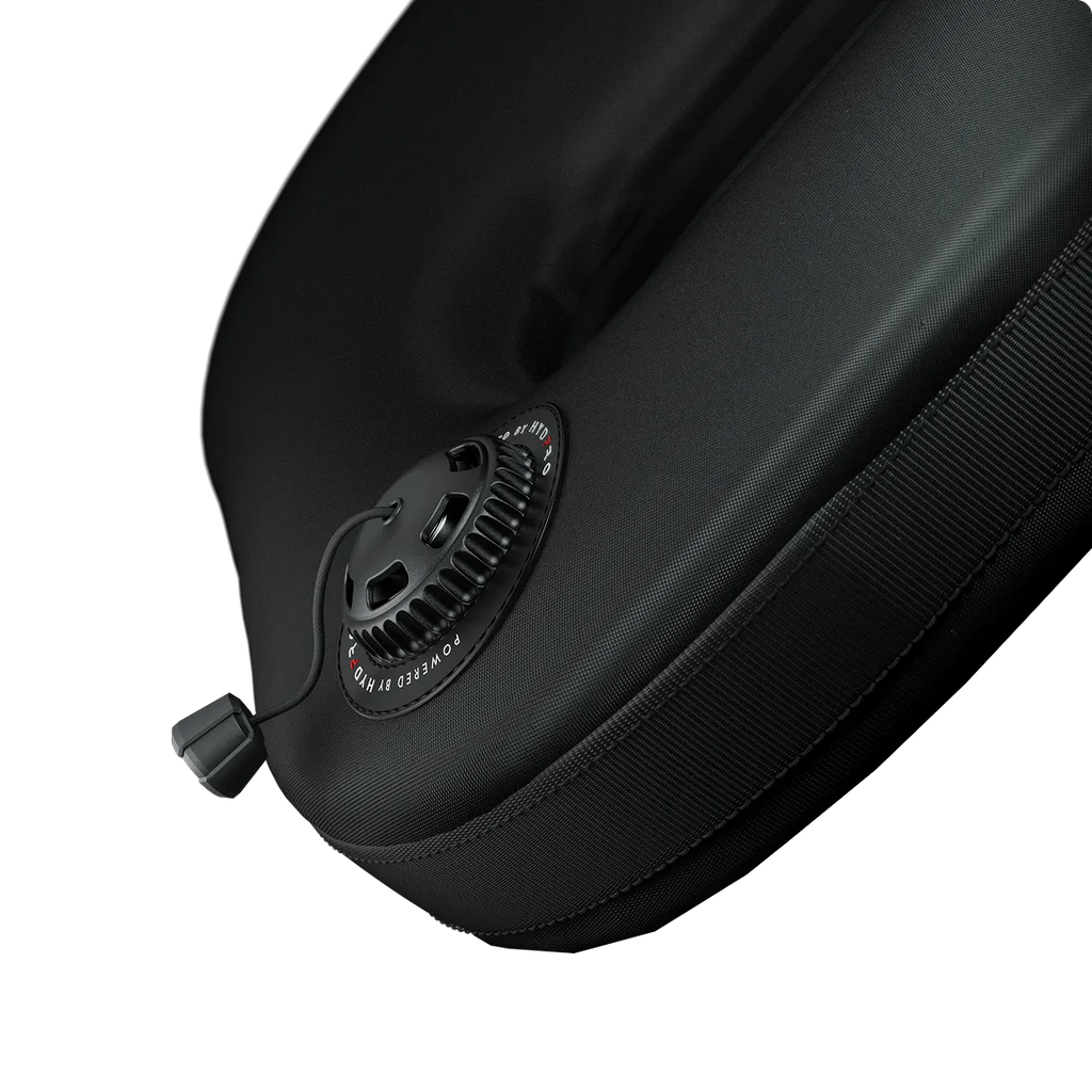 Angled view of the OPV P01 installed at the bladder corner, hose barb and ribbed seam visible