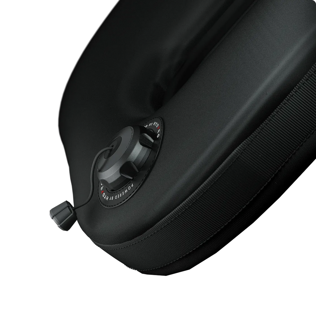 P01 Shield valve mounted on a padded fabric panel, three-quarter angle showing zip trim and dump toggle