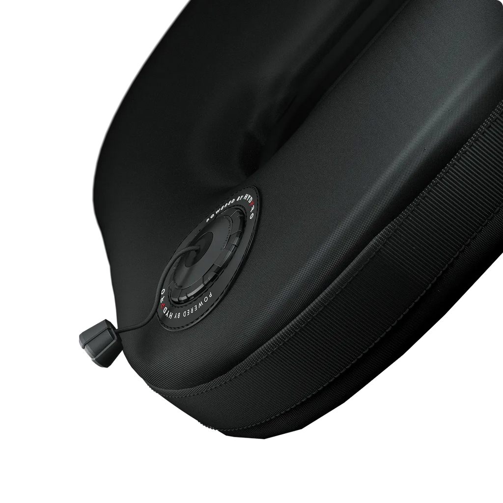 P03 Shield valve mounted on a padded fabric panel, three-quarter angle showing zip trim and dump toggle