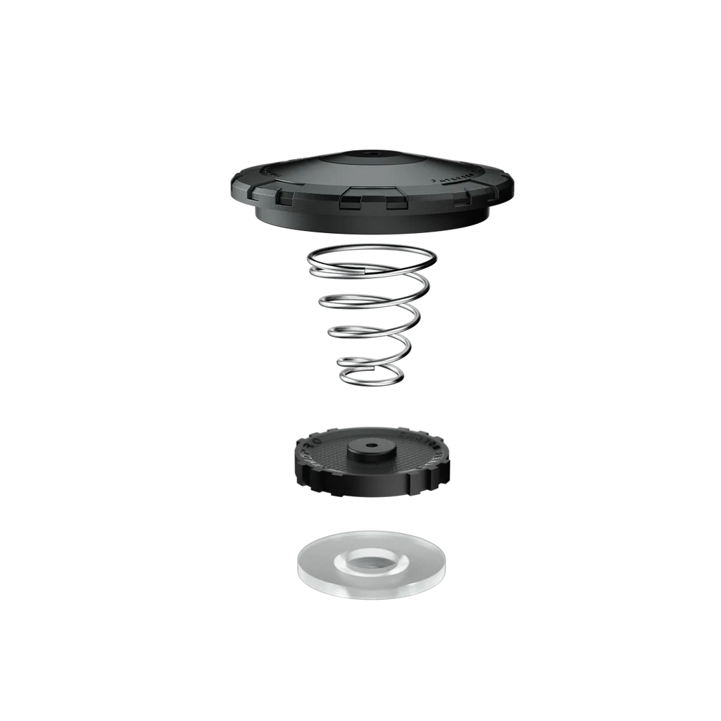 Exploded view of the P03 Shield valve: lid, coil spring, seat and diaphragm in sequence