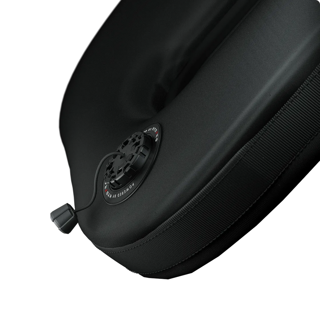 P04 valve mounted on a padded fabric panel, three-quarter angle showing zip trim and dump toggle