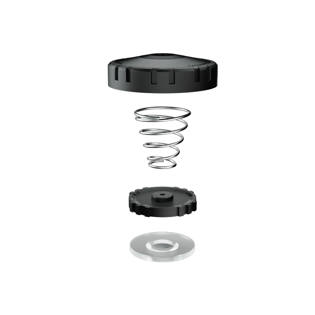 Exploded view of the P04 Shield valve: lid, coil spring, seat and diaphragm in sequence